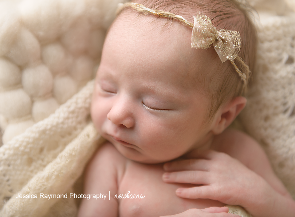 newborn baby photographer san diego california newborn photos baby girl picture with cream headband