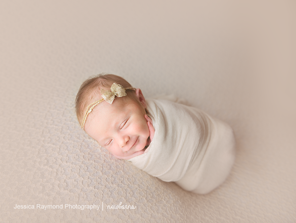 newborn baby photographer san diego california newborn photos baby girl beanbag pose