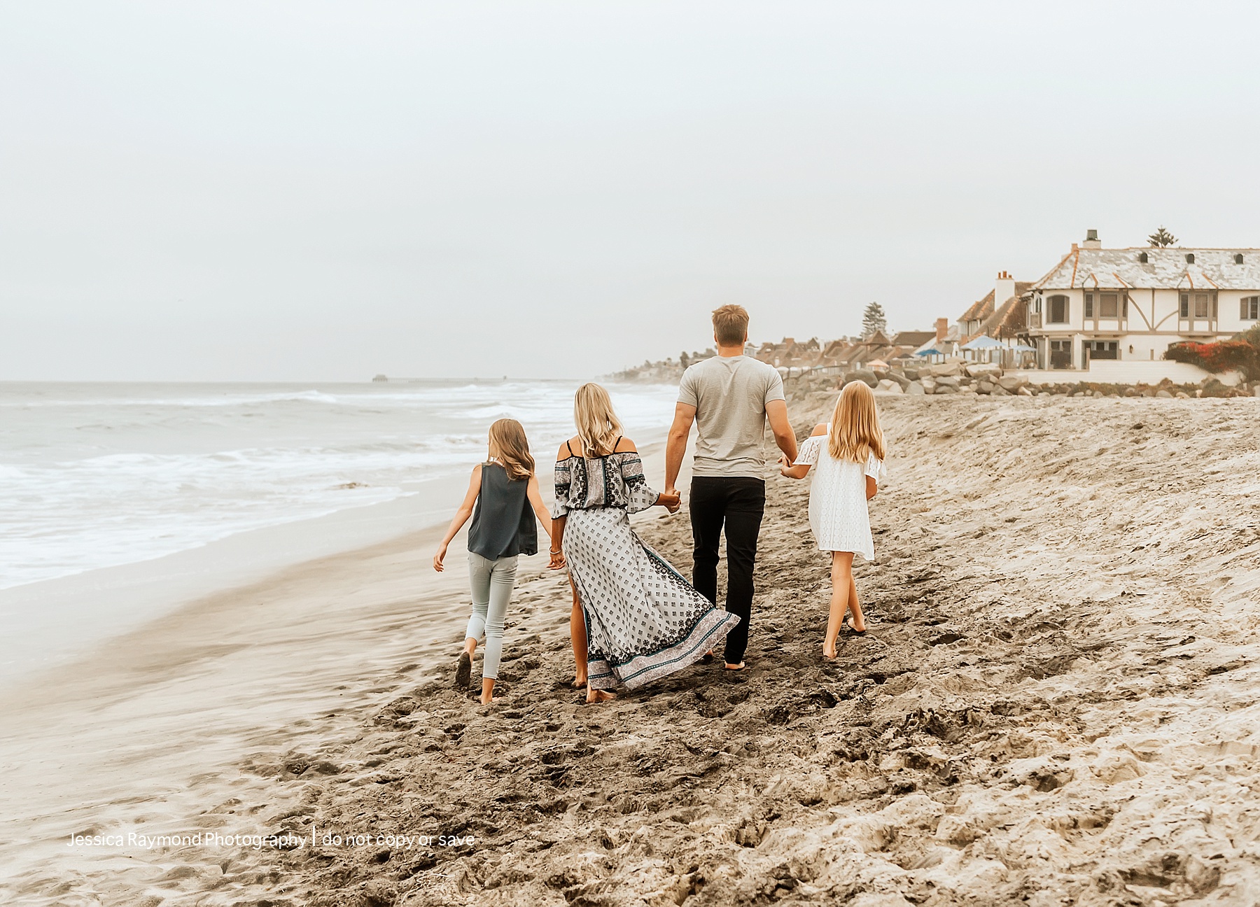 carlsbad beach family photos family of four walking on beach