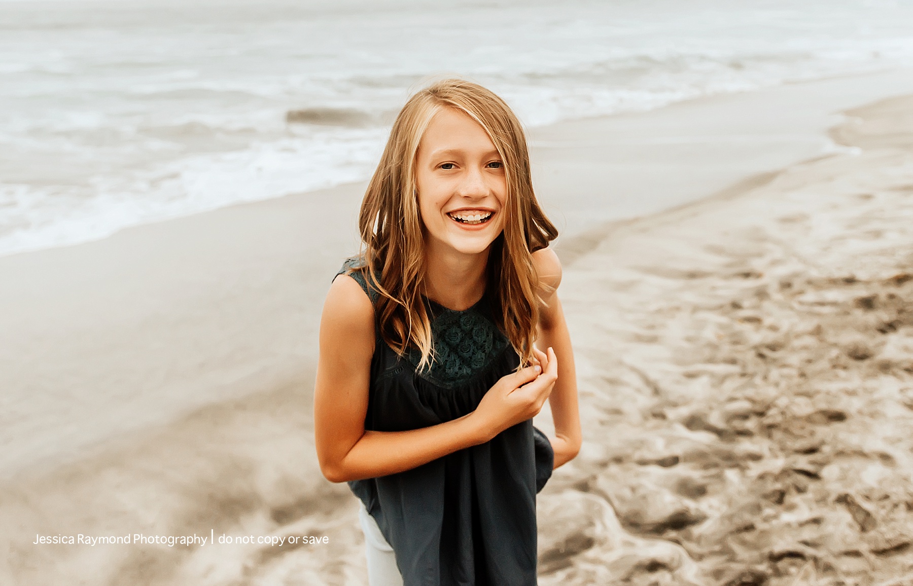 Carlsbad beach photos girl laughing