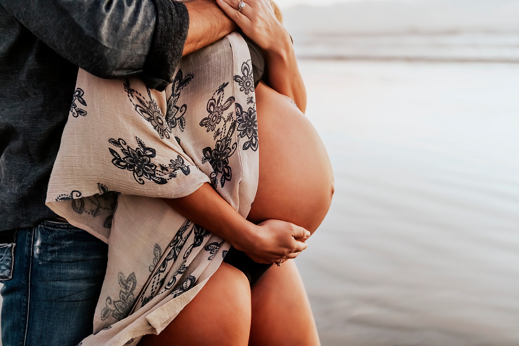 san diego best maternity photographer up close of belly at beach