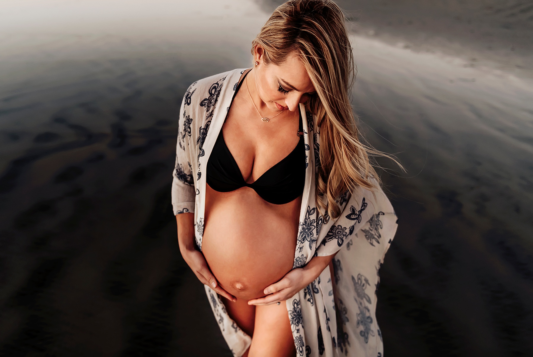 maternity pregnancy pictures pregnant mom on beach wearing bathing suit