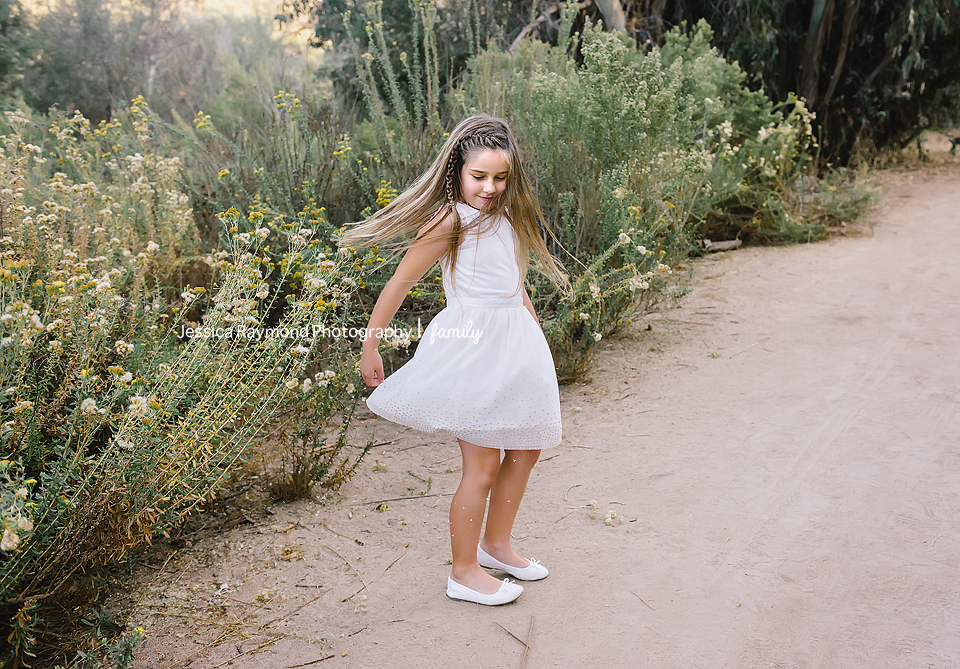escondido family photographer family photos escondido photographers girl in white dress twirling