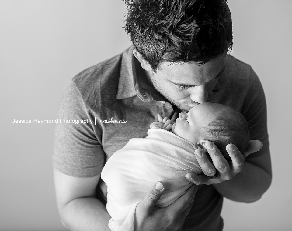 carlsbad newborn and family photographer baby photography dad baby pose black white