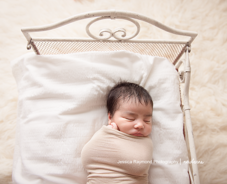 newborn photography san diego newborn photo shoot newborn baby wrapped on bed