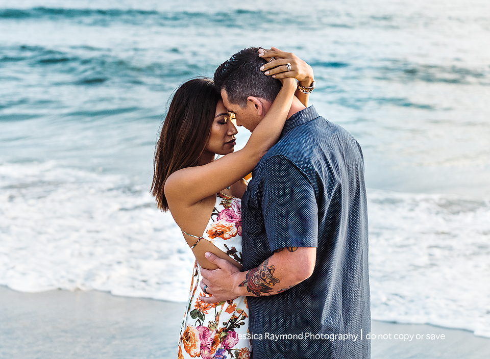 family photography oceanside family photographer couple pose at beach