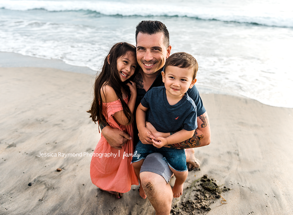 family photography oceanside family photographer dad with kids at beach