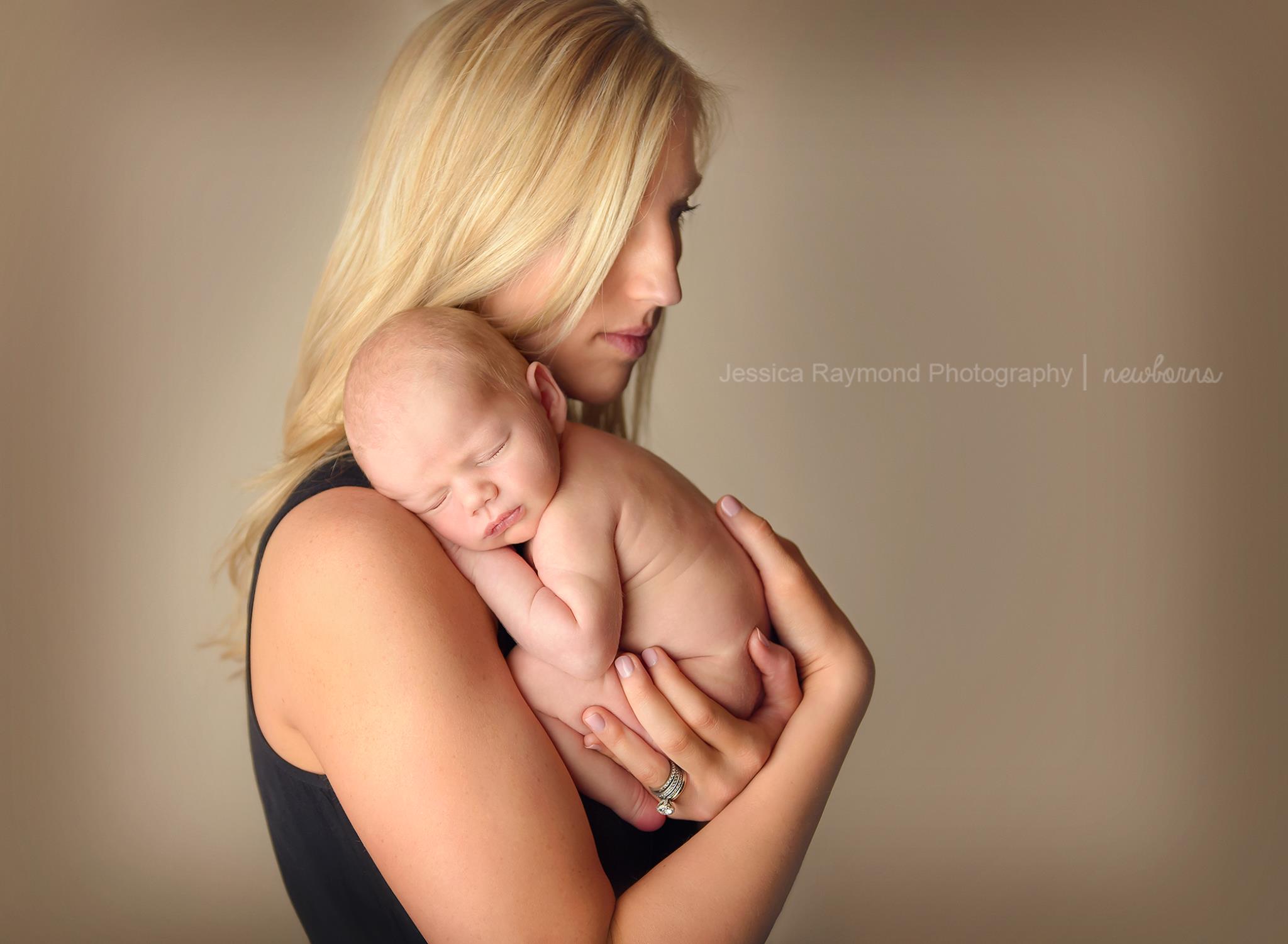 newborn photoshoot san diego newborn safety posing newborn in moms arms