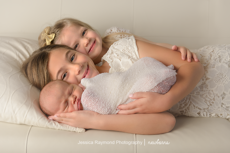 Newborn Photographer in San Diego, CA newborn sibling poses 