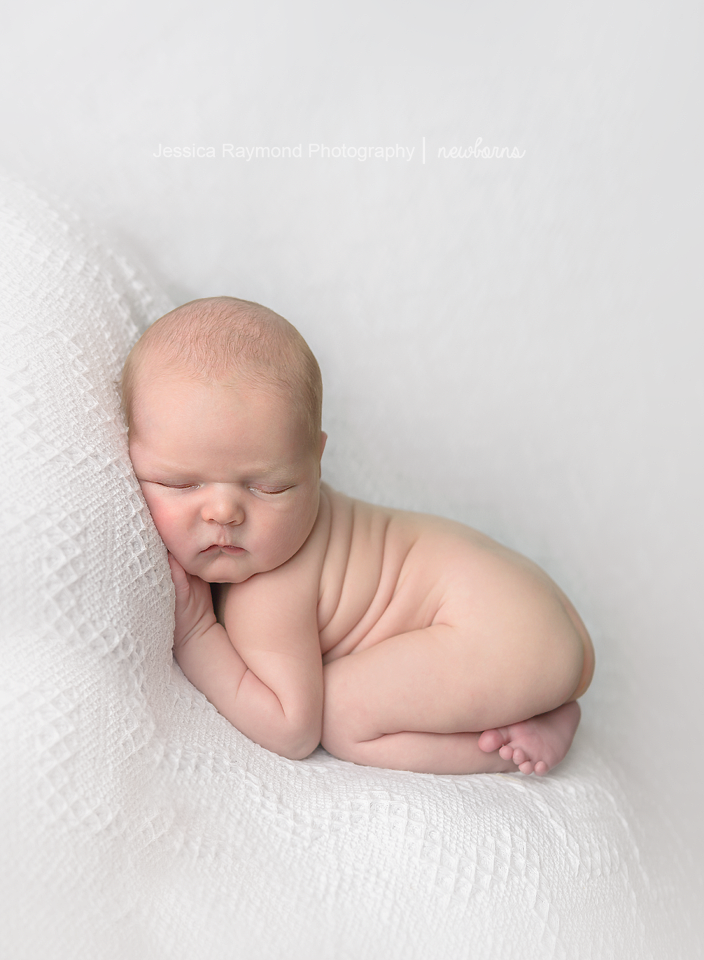 Newborn Photographer in San Diego newborn session bum up pose baby sleeping