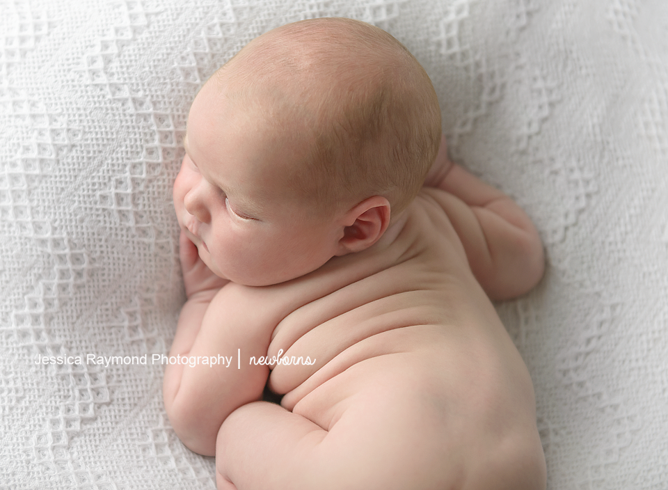 Newborn Photographer in San Diego newborn photography baby rolls