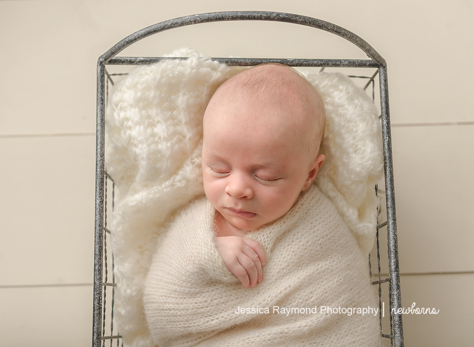 newborn photography studio session carlsbad california baby portraits baby boy in basket