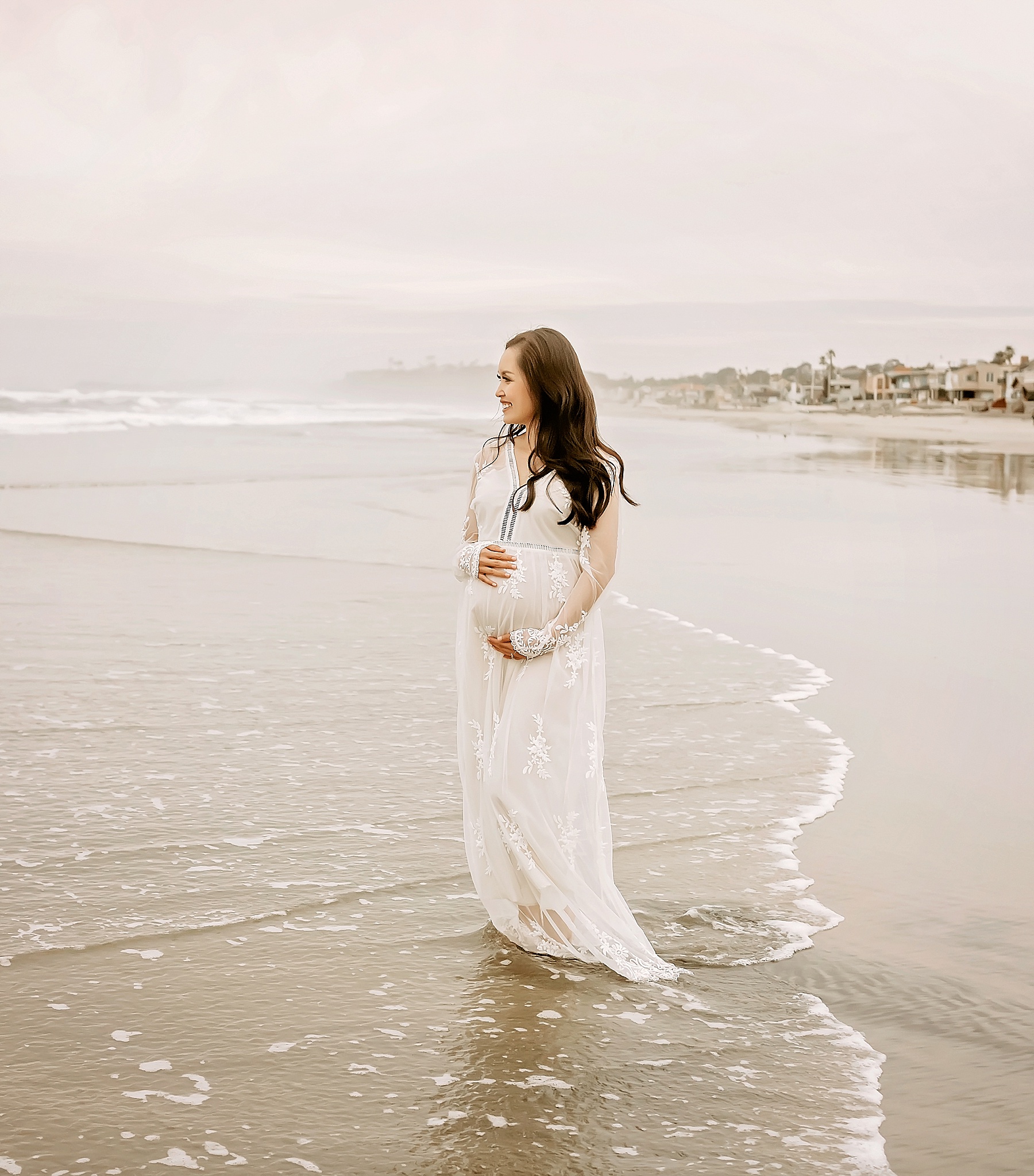 pregnancy photoshoot beach white dress